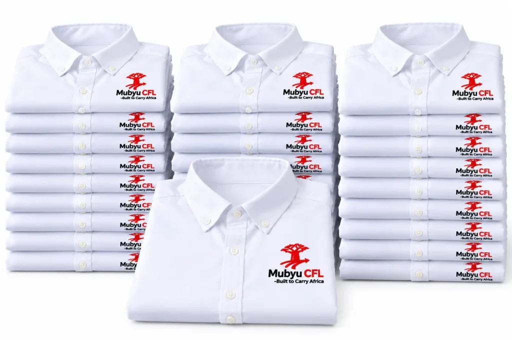 Rendered white shirts with the Mbuyu CFL logo, folded in stacks